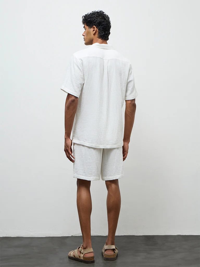 ETA Off-White Crinkle-Textured Relaxed-Fit Mid-Rise Cotton Shorts - Image 4