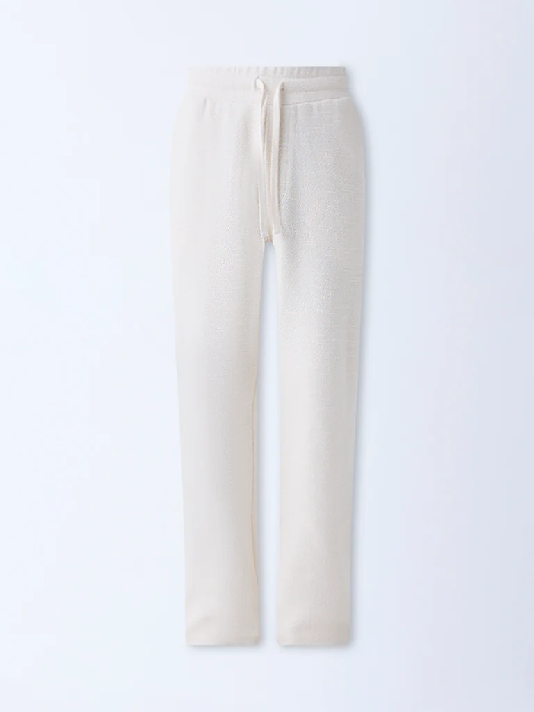 ETA Off-White Relaxed-Fit Mid-Rise Cotton-Blend Pants - Image 5