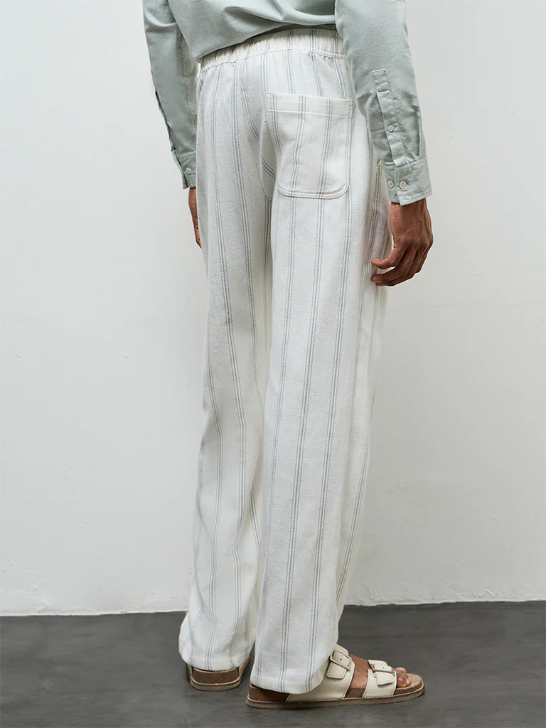 ETA Off-White Striped Relaxed-Fit Mid-Rise Cotton Chinos - Image 4