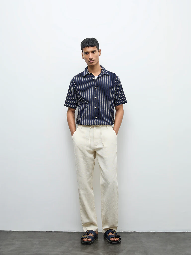 ETA Off-White Textured Relaxed-Fit Mid-Rise Cotton Chinos