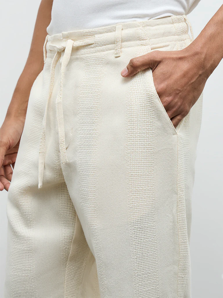 ETA Off-White Textured Relaxed-Fit Mid-Rise Cotton Chinos - Image 3