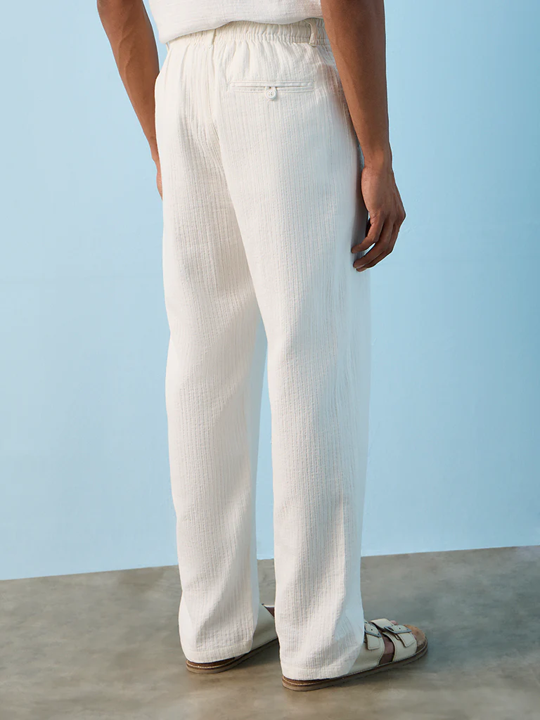 ETA Off-White Textured Relaxed-Fit Mid-Rise Cotton Pants - Image 4