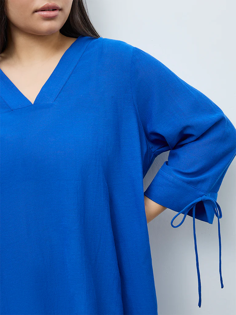 Gia Blue Asymmetrical Blouse - Image 3
