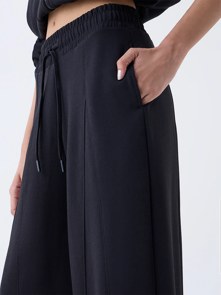 Studiofit Black Solid High-Rise Flared Pants - Image 3