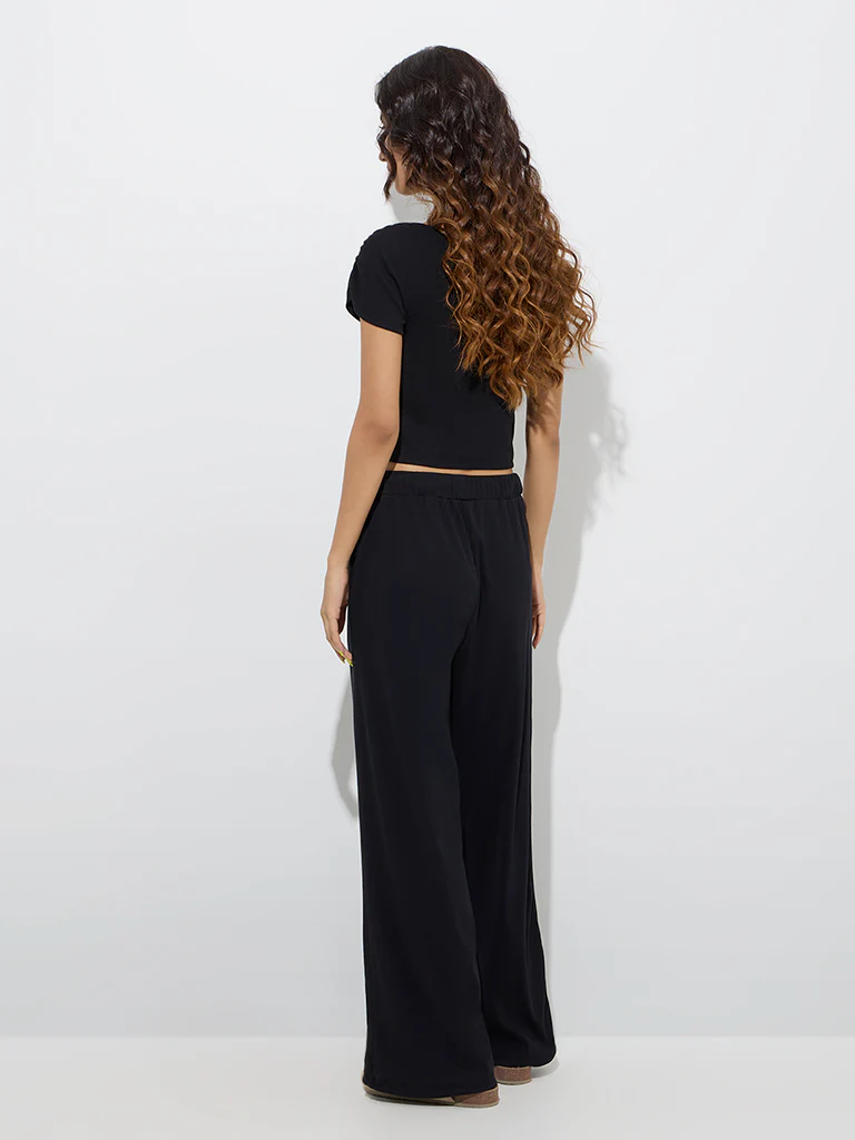 Superstar Black Ribbed High-Rise Cotton-Blend Pants - Image 4