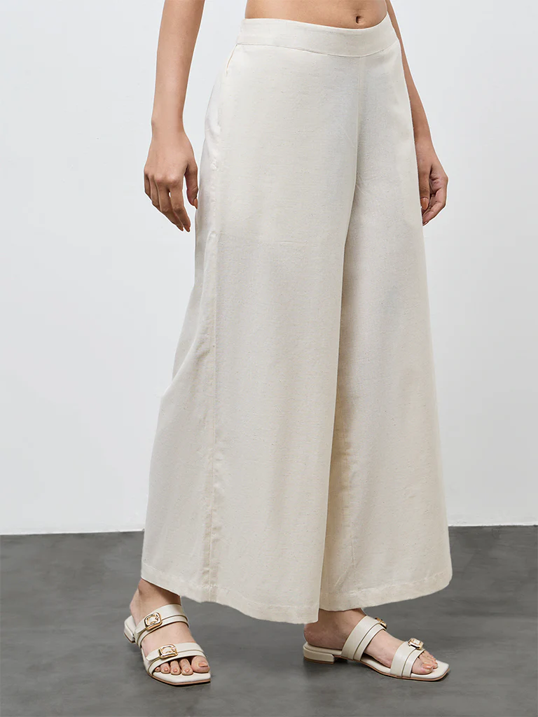 Utsa Off-White Solid Cotton-Blend Palazzos