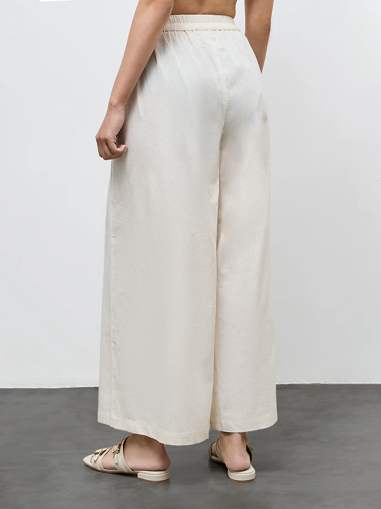 Utsa Off-White Solid Cotton-Blend Palazzos - Image 4