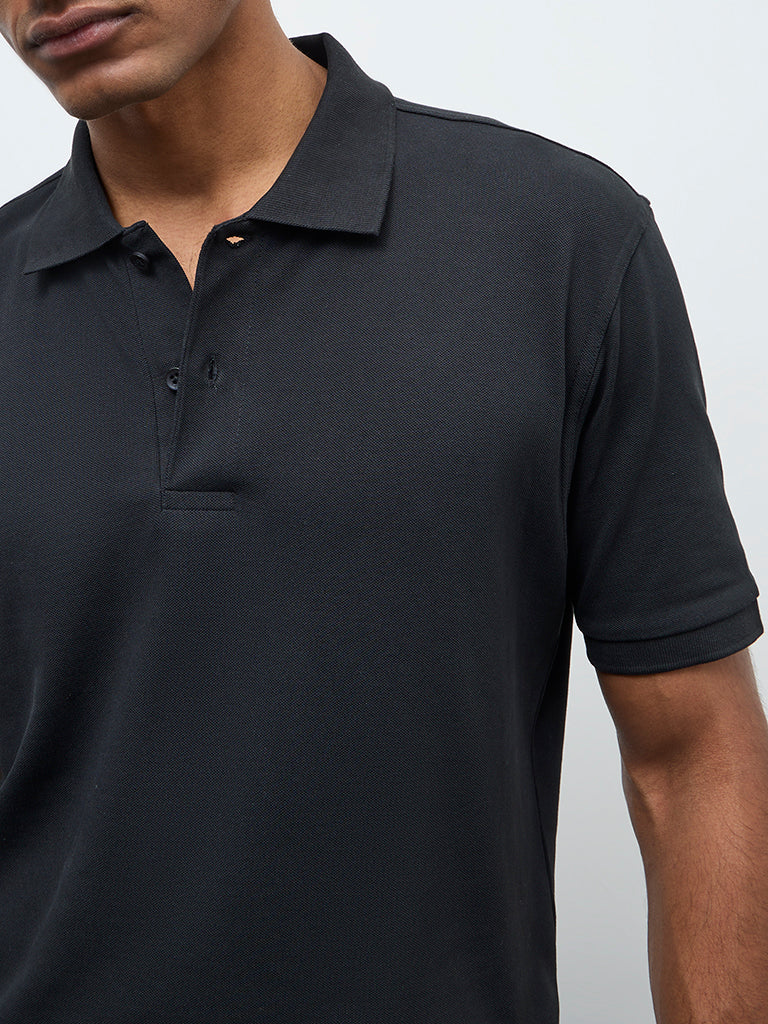 WES Casuals Black Solid Relaxed-Fit Polo T-Shirt - Image 3