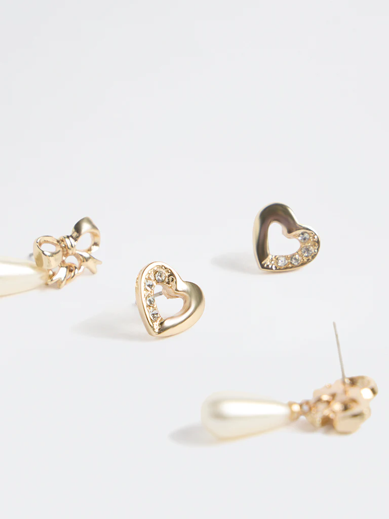 Westside Accessories Gold Heart and Bow Earrings - Image 3