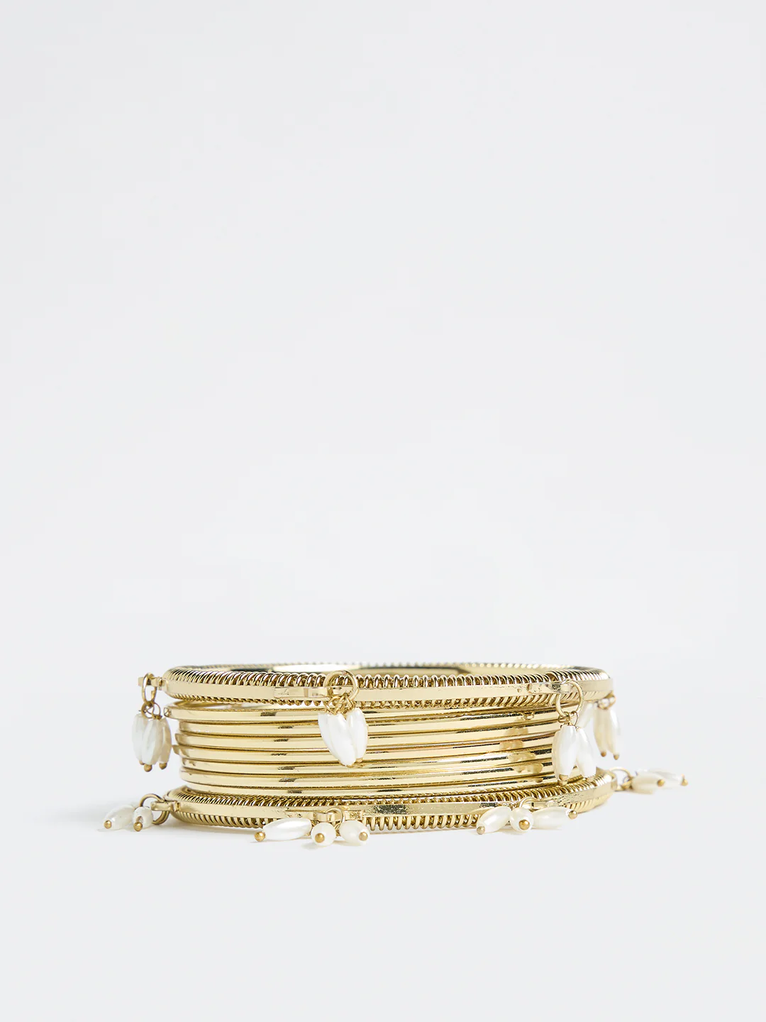 Westside Accessories Gold Rice Pearl Bangles - Pack of 9