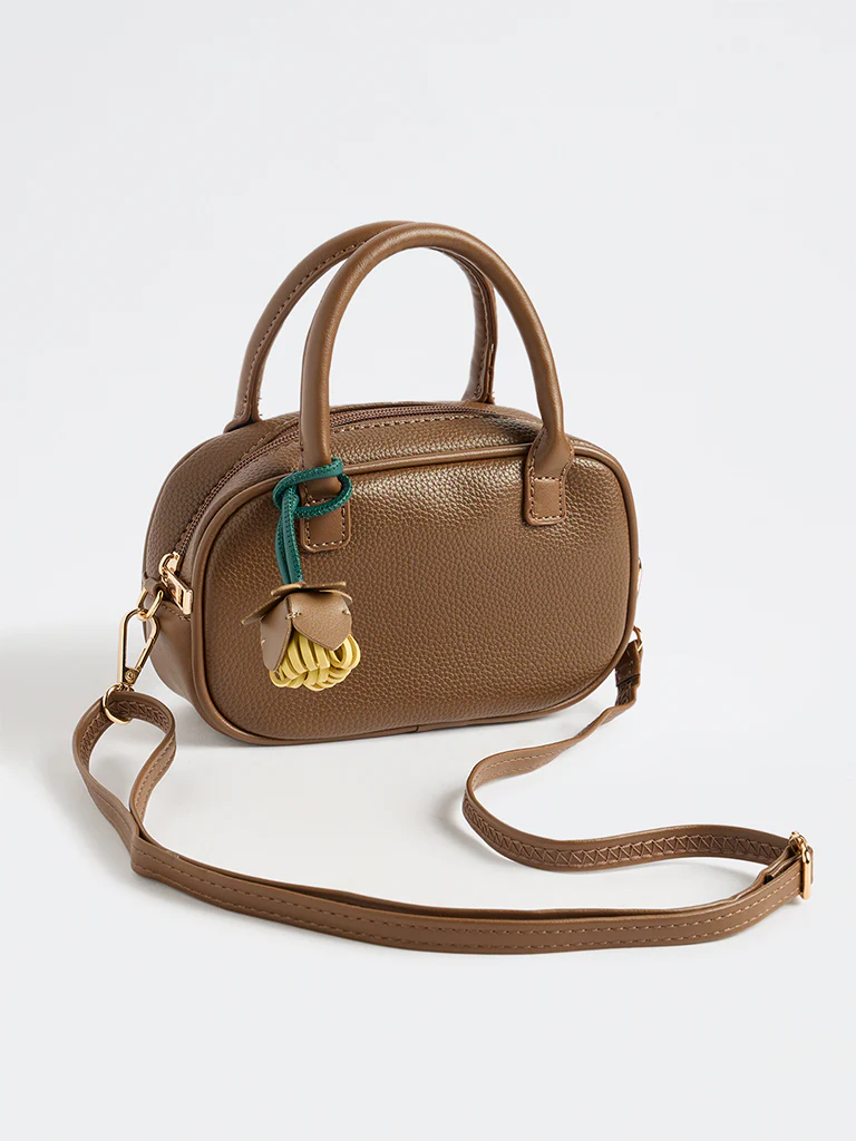 Westside Dark Brown Textured Sling Bag with a Floral Bag Charm - Image 2