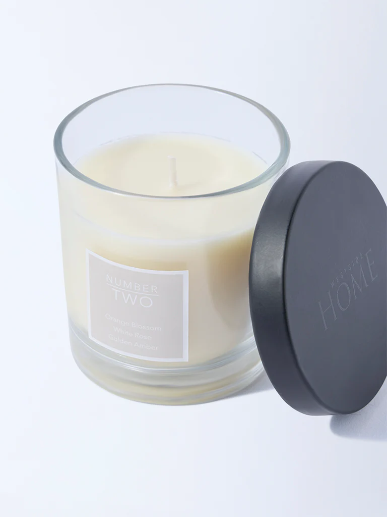 Westside Home Clear White Amber Scented Glass Candle - Image 3