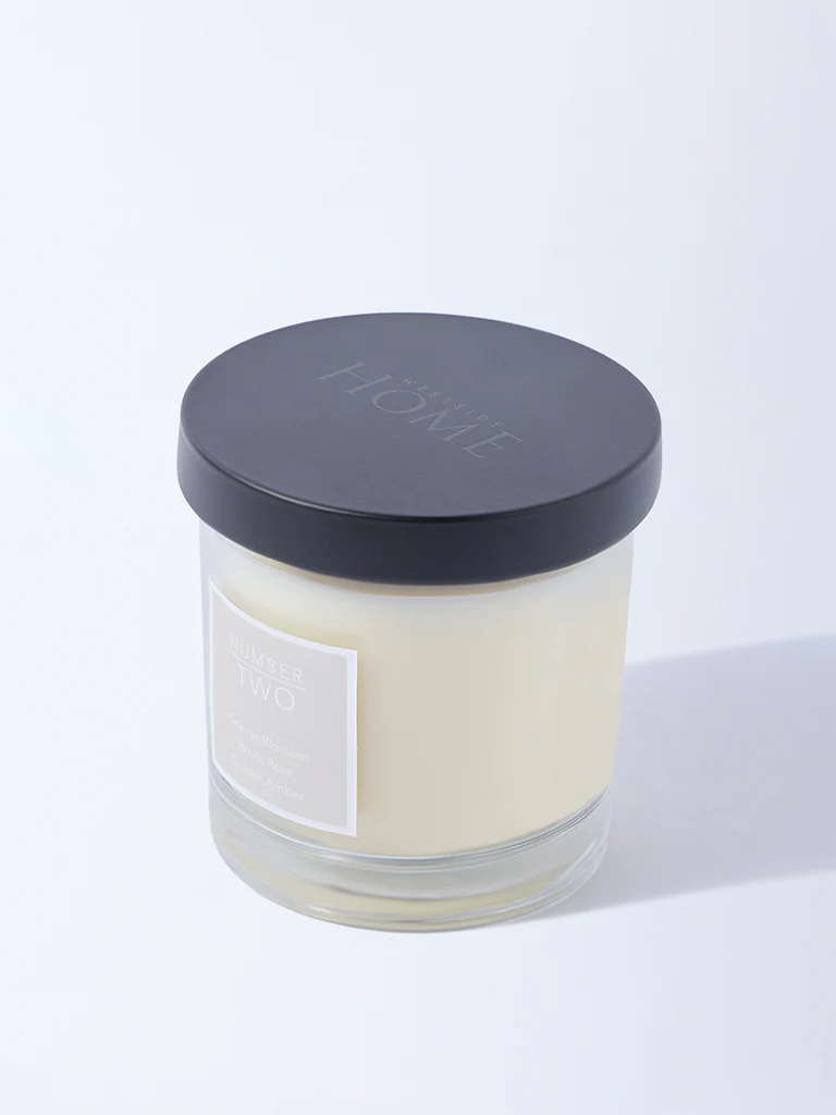 Westside Home Clear White Amber Scented Glass Candle - Image 2