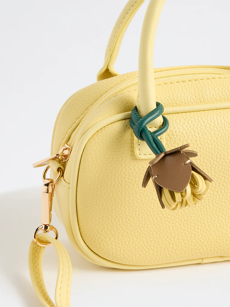 Westside Yellow Textured Sling Bag with a Floral Bag Charm - Image 3